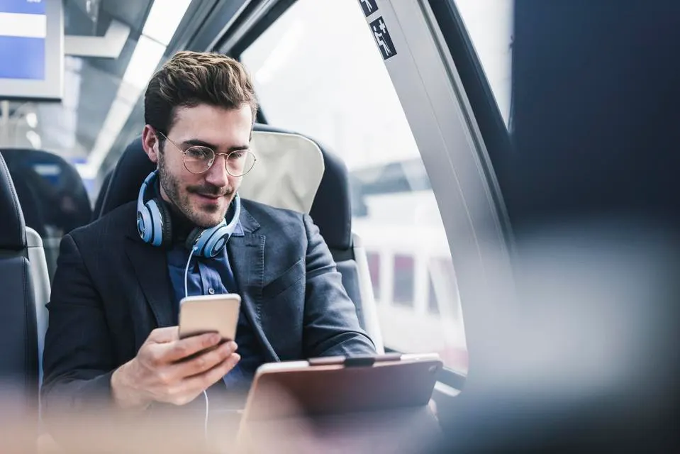 A man working from a train